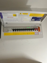 a white box with a yellow label on it